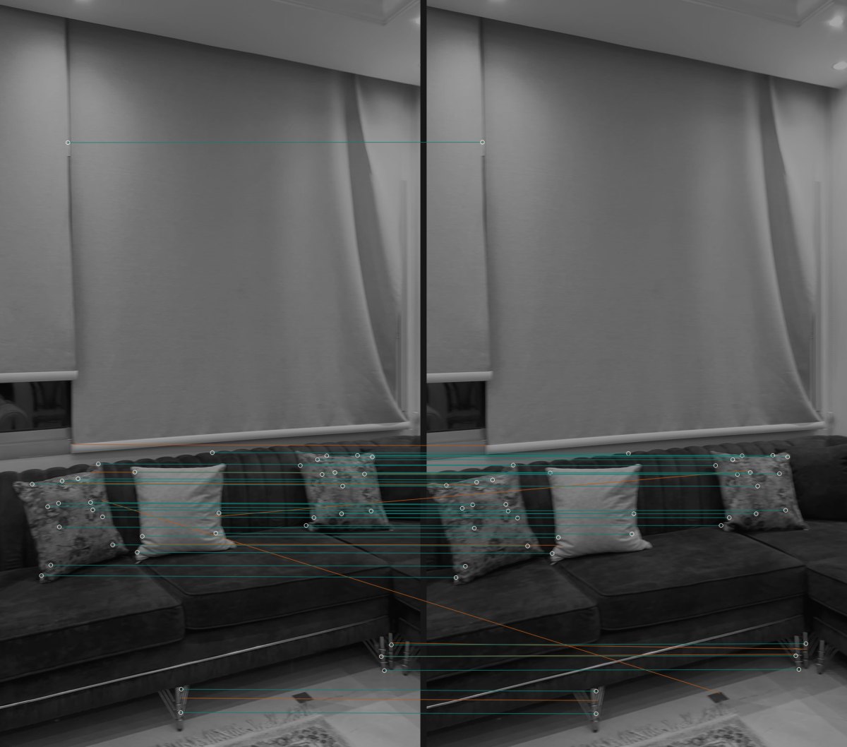 Two consecutive frames side by side with teal lines linking matched ORB features and amber lines showing rejected outliers